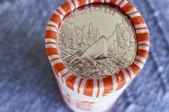A roll of newly released Frank Church River of No Return Wilderness quarters is photographed on Wednesday, Nov. 6, 2019, following a ceremony at Salmon Junior-Senior High School in Salmon, Idaho, Salmon, Idaho. The coin is the 50th in the U.S. Mint’s America the Beautiful series of quarters. The coin shows a drift boat pilot navigating the wild River of No Return among its features. (© 2019 Cindi Christie/Cyanpixel)